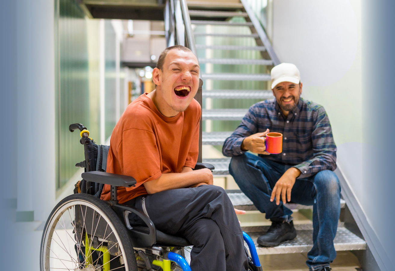 ACES$ Alabama caregiver hugging a teen boy with developmental disabilities