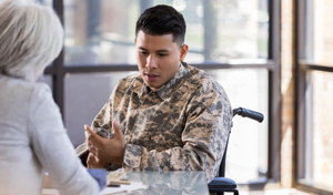 MyCIL Veteran Directed Care Participant in a meeting