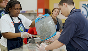 TSC Students in the kitchen working together