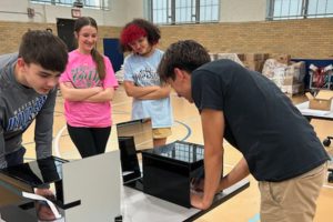 a student at the learning differences simulation station