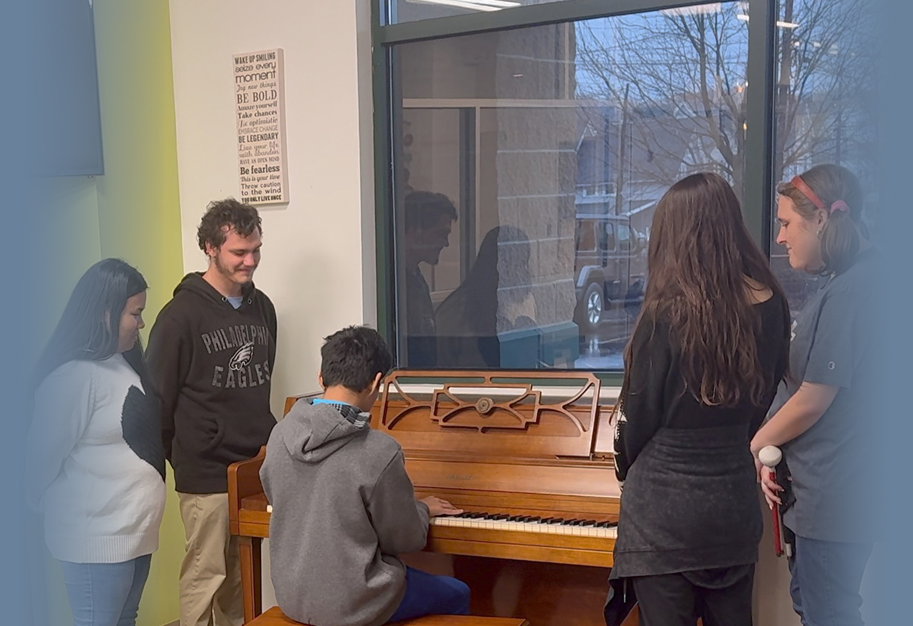 TSC Students Playing the Piano