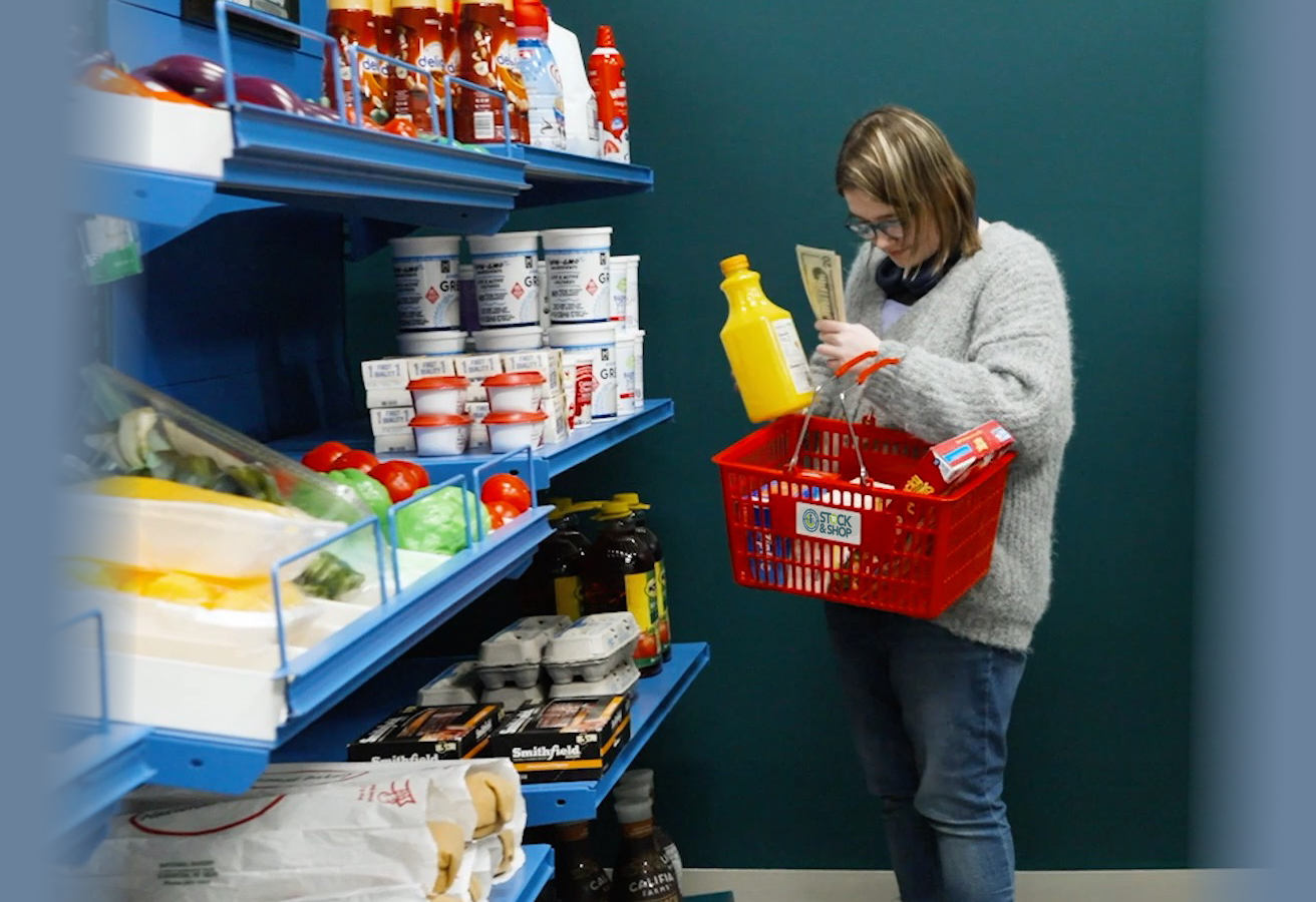 A TSC Student shopping in TSC's Stock N Shop